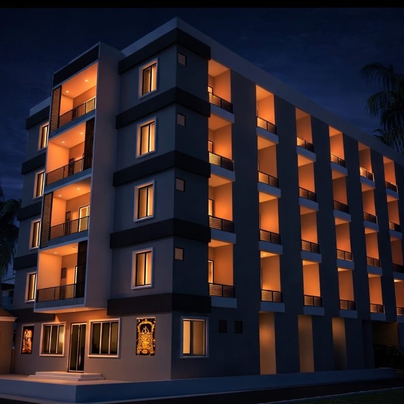 Majestic elevation of Vutukuru Vaari Hari Om Yatri Nivas in Kashi light